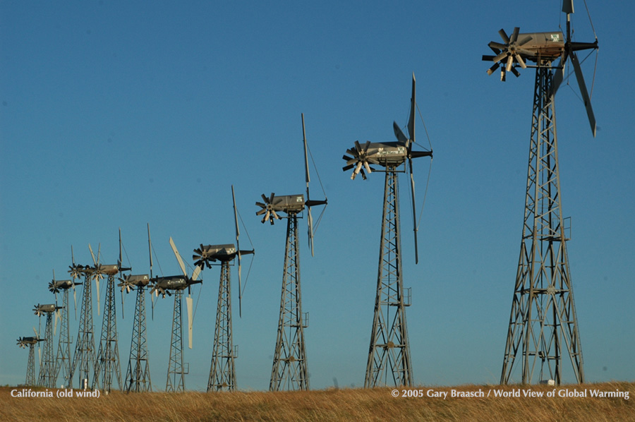 Outdated and bird-killing WInd-matic turbines, 109 foot towers and blades looking more like farm water well windmills. This type tower being dismantled. Altamont Pass, California. 